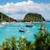 A bay in Corfu, Greece with yachts and sailboats floating in the water